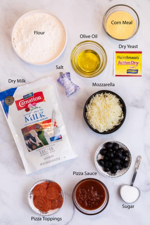 Overhead shot of ingredients for Pizza Hut Pizza and dough
