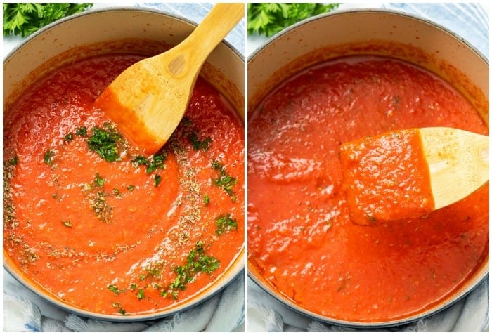 Seasonings being stirred into a pot of marinara sauce.