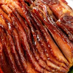 A labeled image of glazed ham on a platter with parsley.