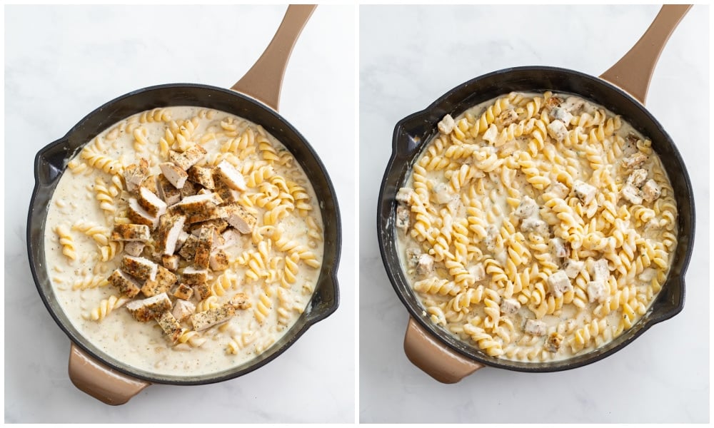 Adding chicken to a skillet of white cheddar pasta.